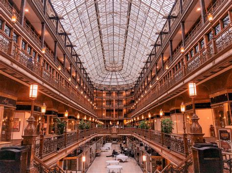 A Photo Of The Cleveland Skyline And The Arcade In Cleveland With Text