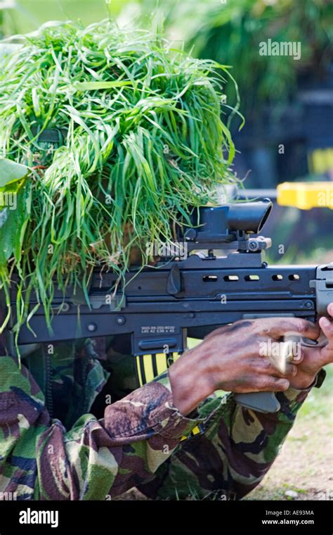 British Army Infantry Man On Excercise Shooting Sa 80 Assault Rifle Bullet Casing Being