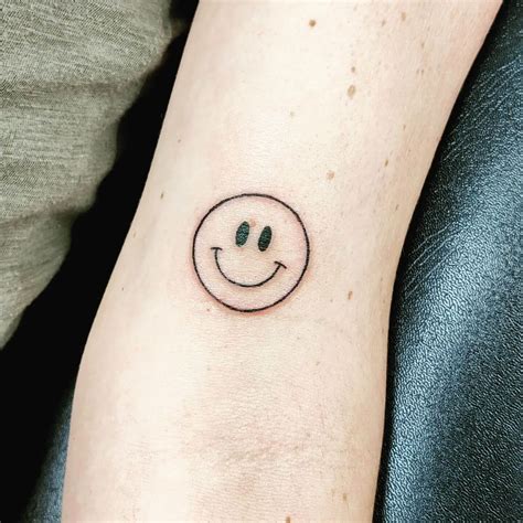 Tattoo Of Smiley Face